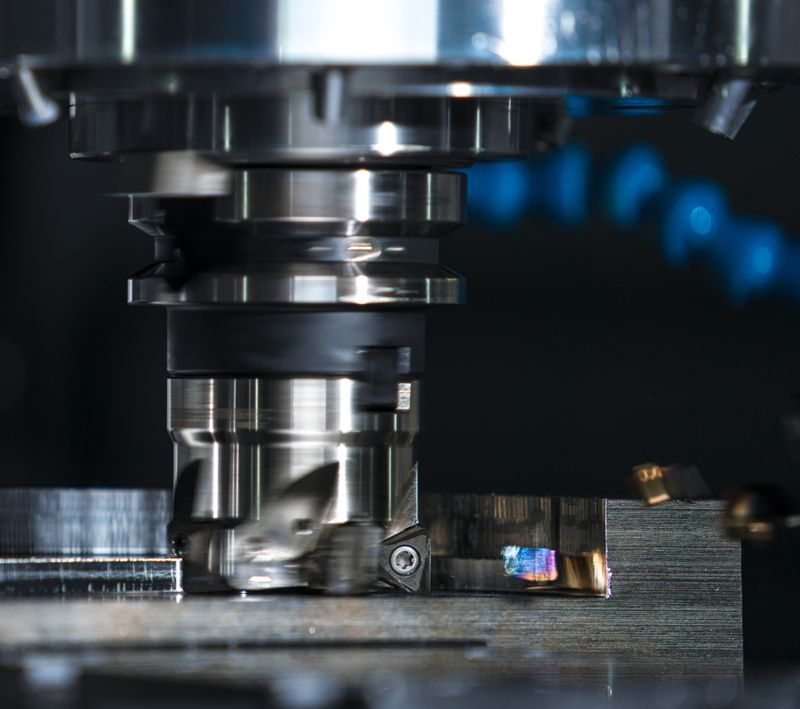 CNC milling machine cutting metal
